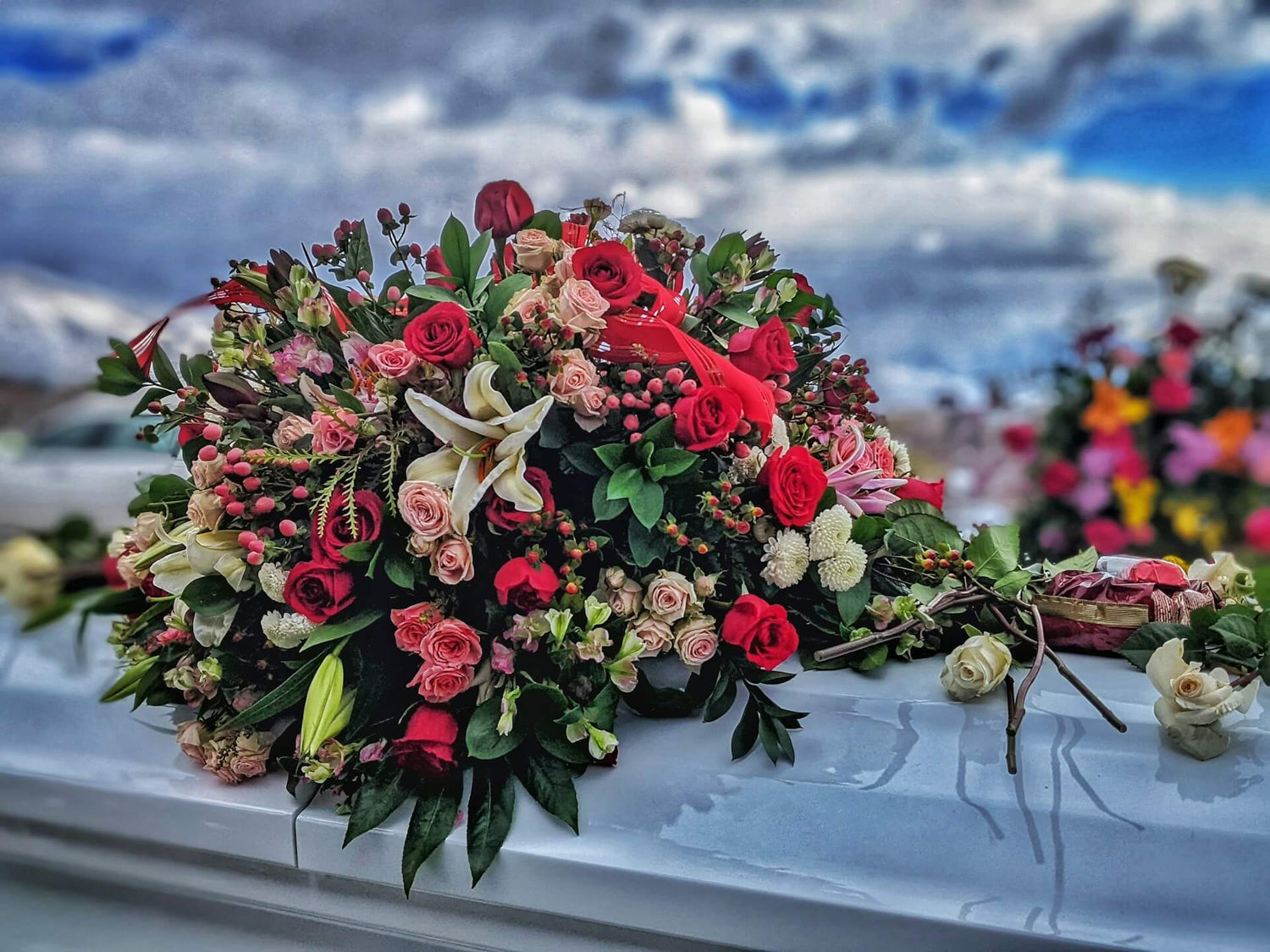A bouquet of flowers on a casket